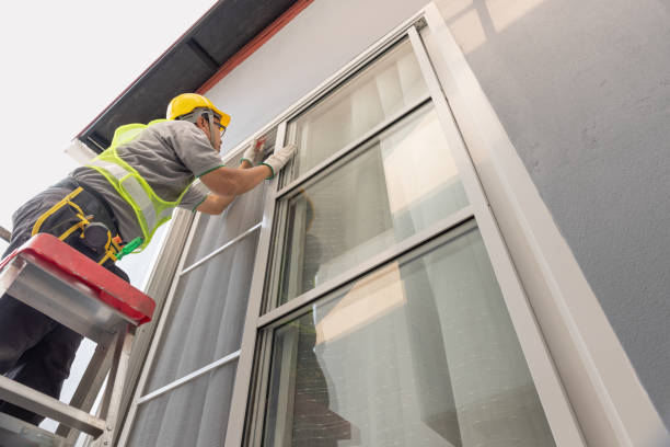 A man fixing window glass